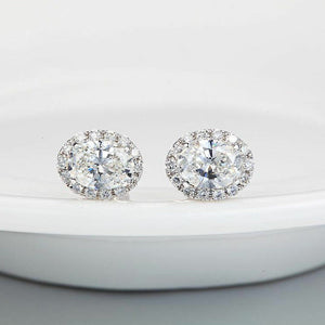 1.0ctw 6x4mm Oval Moissanite Earrings Solitaire with Accents 14K White Gold over